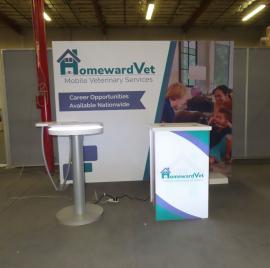 SYK-1024 Symphony Portable Display with SEG Fabric Graphic, MOD-1462 Wireless Bistro Charging Table, and MOD-1701c Backlit Counter with Locking Storage